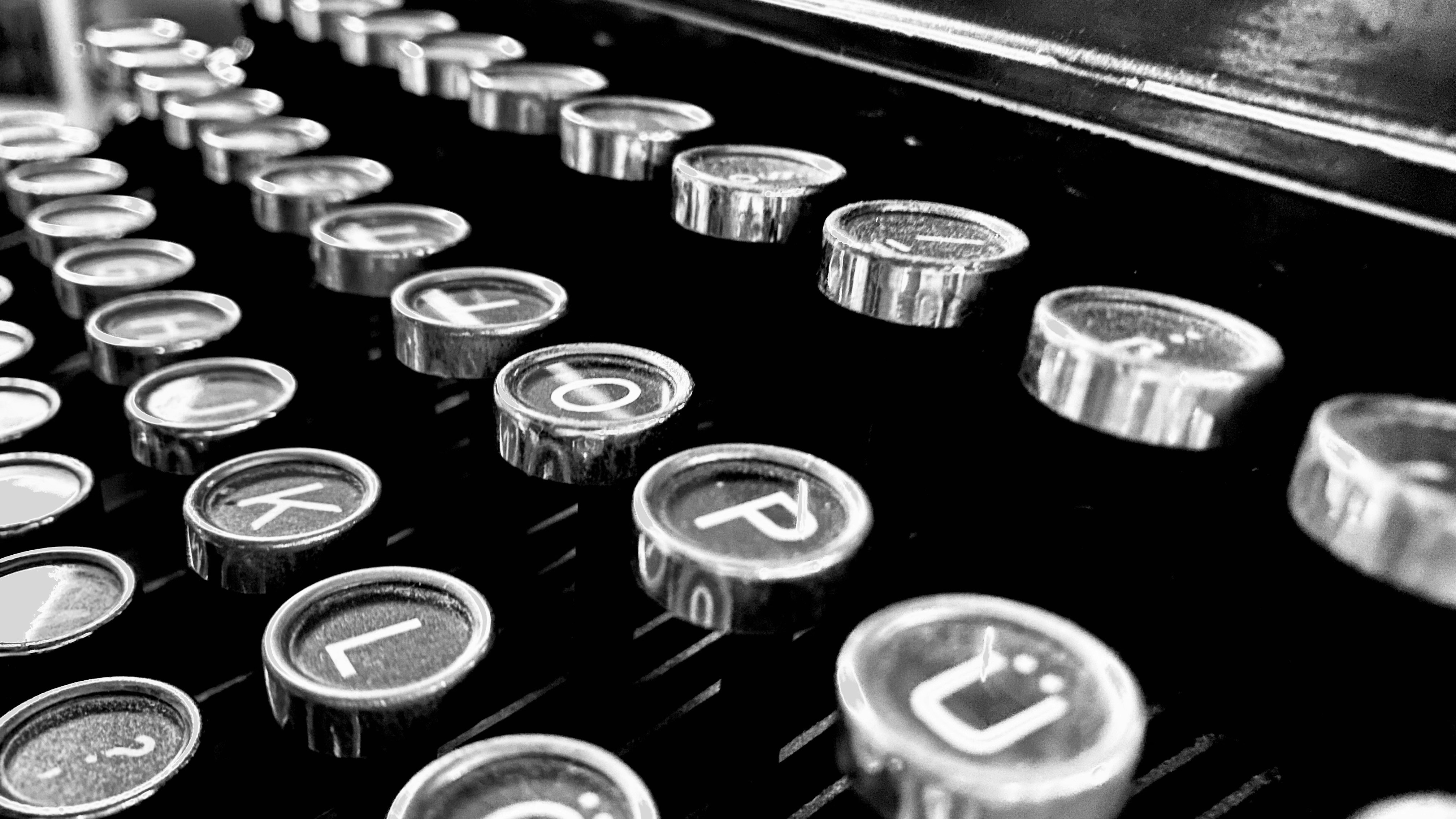 black and white typewriter button